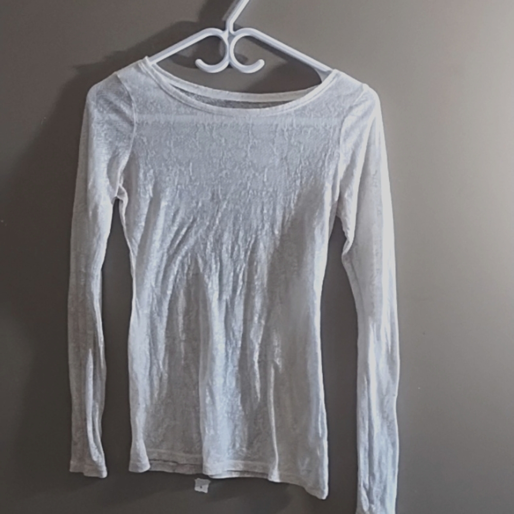 Women's  xs ( easily fit small) cream sheer Express top